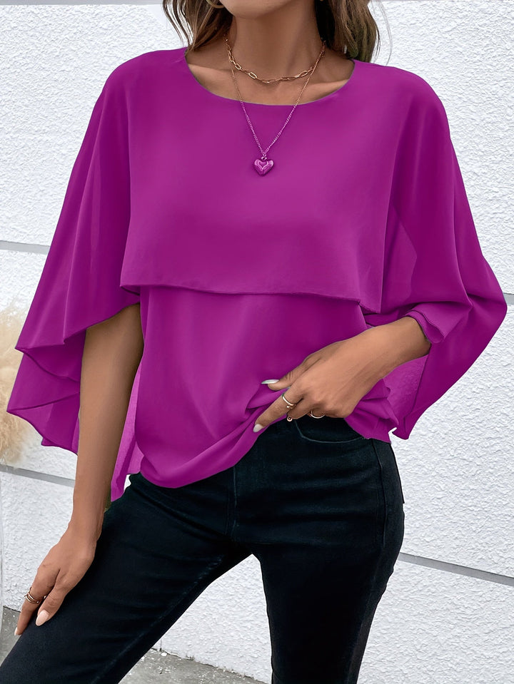 Lina – Asymmetrical Hem Round Neck Blouse