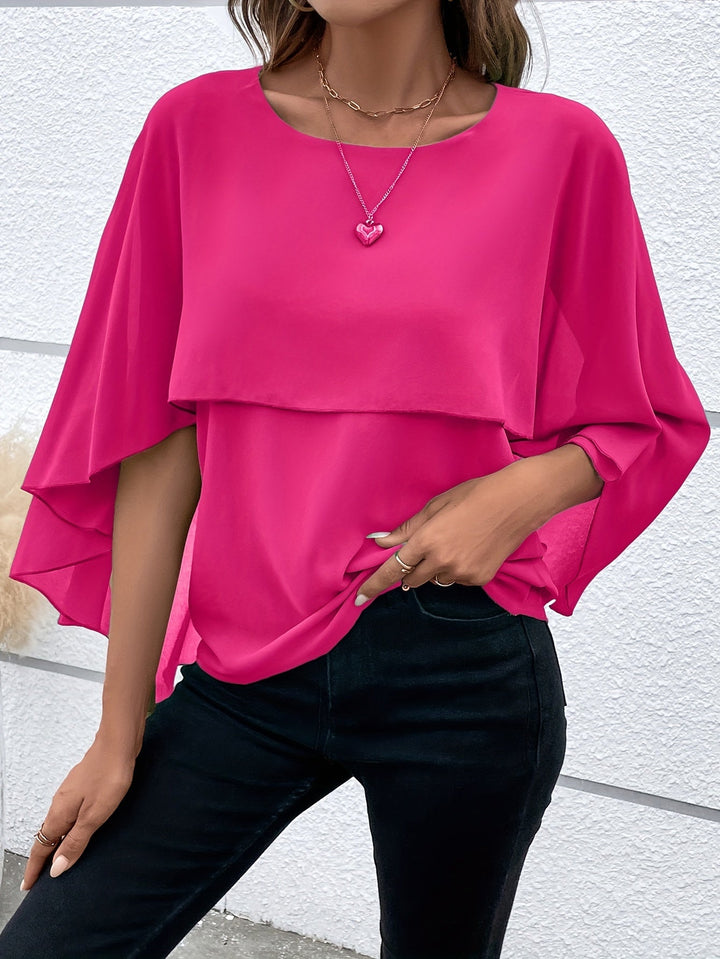 Lina – Asymmetrical Hem Round Neck Blouse